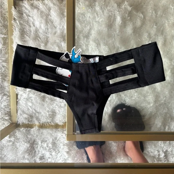 Iheartraves Black cut out bottoms 
Size S/M - Picture 2 of 4